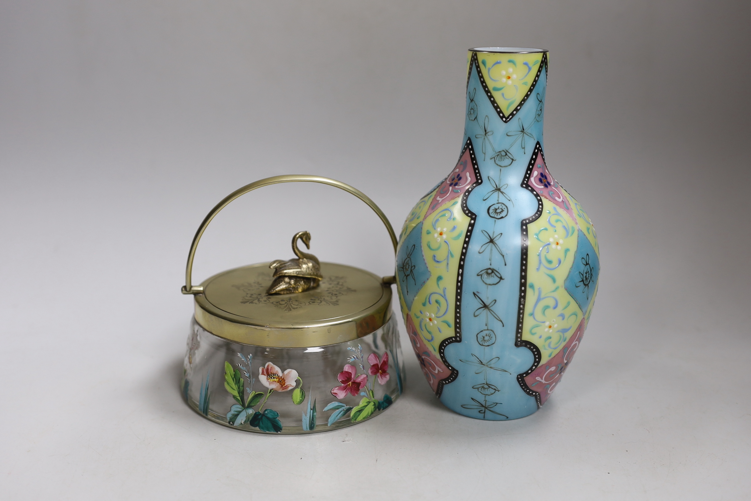 A Bohemian enamelled glass jar with silver plated cover, possibly Moser, together with a French enamelled glass vase. Tallest 20cm